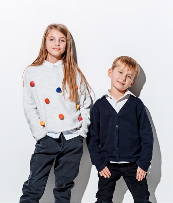 Two children wearing the new arrivals collection